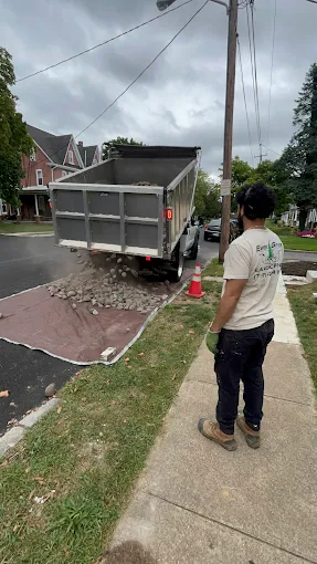 EverGreat Landscaping truck delivering stone